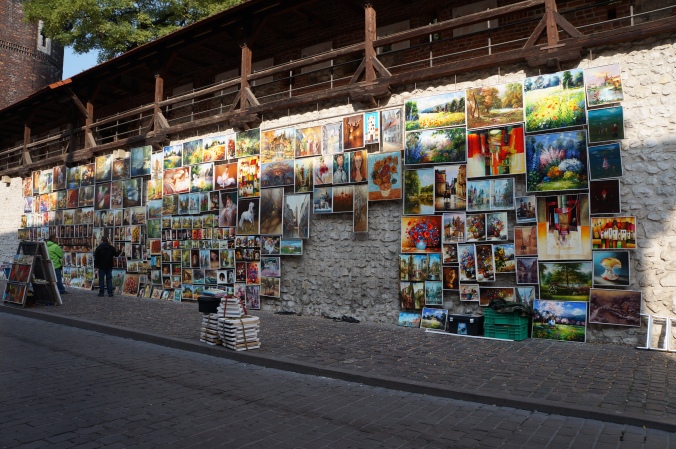 Street artists displaying their canvases
